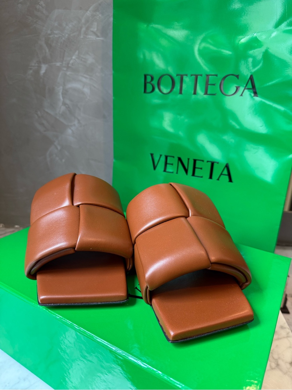 Bottega Veneta Padded Intrecciato Slide Sandals in Cognac Brown